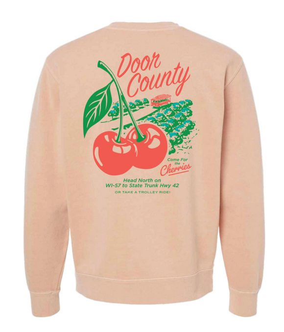 Dusty pink sweatshirt with cherry graphic and 'Door County' text on a white background