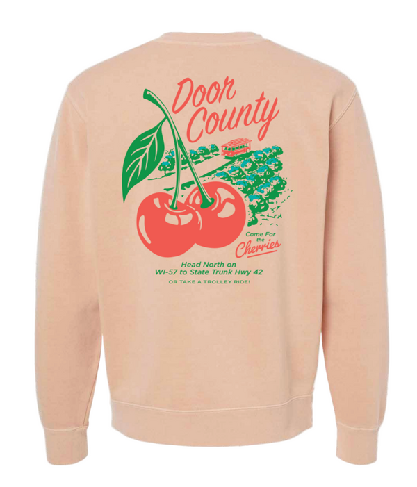 Dusty pink sweatshirt with cherry graphic and 'Door County' text on a white background